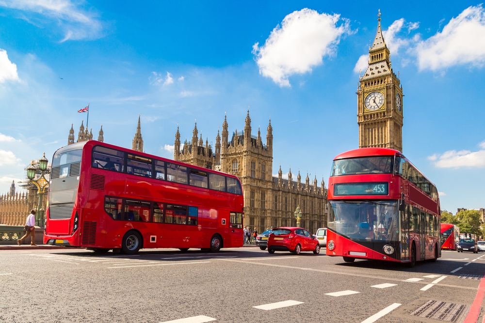 Big Ben and red buses on Westminster Bridge, London